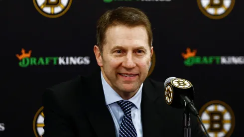 Boston Bruins interim head coach Joe Sacco smiles at his news conference following their 1-0 win over the Utah Hockey Club at TD Garden on November 21, 2024 in Boston, Massachusetts.