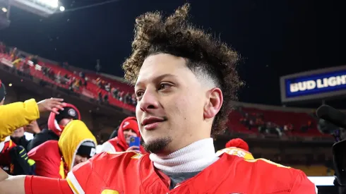 Patrick Mahomes #15 of the Kansas City Chiefs celebrates with fans after defeating the Houston Texans in the AFC Divisional Playoff at GEHA Field at Arrowhead Stadium on January 18, 2025 in Kansas City, Missouri.