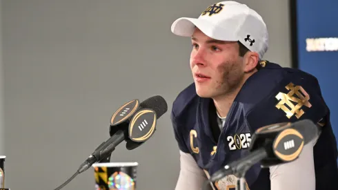 Riley Leonard #13 of the Notre Dame Fighting Irish speaks during a press conference after the 2025 CFP National Championship game against the Ohio State Buckeyes at Mercedes-Benz Stadium on January 20, 2025 in Atlanta, Georgia. Notre Dame Fighting Irish defeated the Ohio State Buckeyes 34-23.