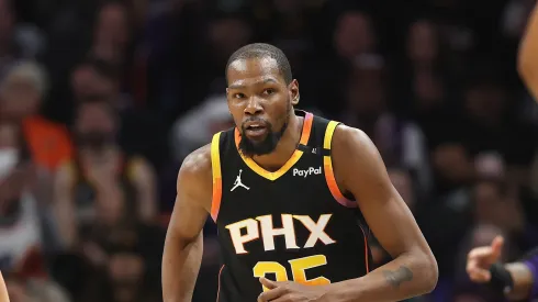 Kevin Durant #35 of the Phoenix Suns reacts to a three-point shot against the Washington Wizards