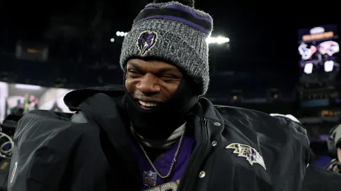 Lamar Jackson #8 of the Baltimore Ravens celebrates after defeating the Houston Texans in the AFC Divisional Playoff game at M&T Bank Stadium on January 20, 2024 in Baltimore, Maryland.