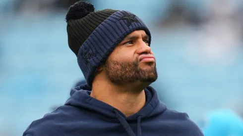 Dak Prescott #4 of the Dallas Cowboys looks on before the game against the Carolina Panthers at Bank of America Stadium on December 15, 2024 in Charlotte, North Carolina.