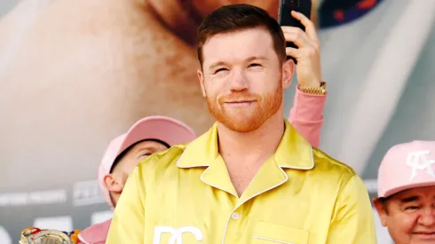 Undisputed super middleweight champion Saul “Canelo” Alvarez of Mexico smiles toward the crowd at the ceremonial weigh-in at Toshiba Plaza on September 29, 2023 in Las Vegas, Nevada.