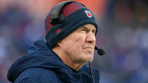 Head coach Bill Belichick of the New England Patriots looks on during the first half of a game against the Buffalo Bills at Highmark Stadium on December 31, 2023 in Orchard Park, New York.