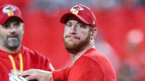 Carson Wentz (11) warms up before a game against the Tampa Bay Buccaneers at GEHA Field at Arrowhead.