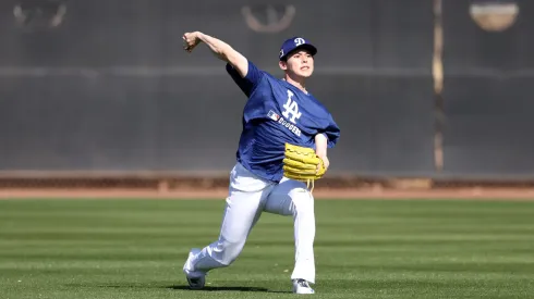 Roki Sasaki #11 of the Los Angeles Dodgers throw during workouts at Camelback Ranch on February 11, 2025 in Glendale, Arizona.