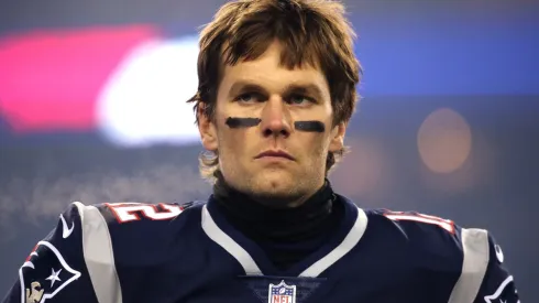 Tom Brady #12 of the New England Patriots looks on before the AFC Divisional Playoff game against the Tennessee Titans at Gillette Stadium on January 13, 2018 in Foxborough, Massachusetts.