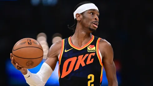 Shai Gilgeous-Alexander #2 of the Oklahoma City Thunder handles the ball during the first half against the Dallas Mavericks at Paycom Center on April 14, 2024 in Oklahoma City, Oklahoma.