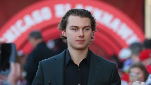 Connor Bedard #98 of the Chicago Blackhawks arrives to the red carpet prior to the Chicago Blackhawks home opener against the San Jose Sharks at the United Center on October 17, 2024 in Chicago, Illinois.