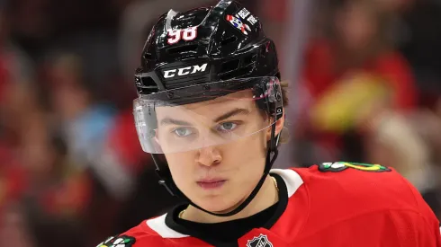 Connor Bedard #98 of the Chicago Blackhawks looks on against the Columbus Blue Jackets during the second period at the United Center on December 01, 2024 in Chicago, Illinois.