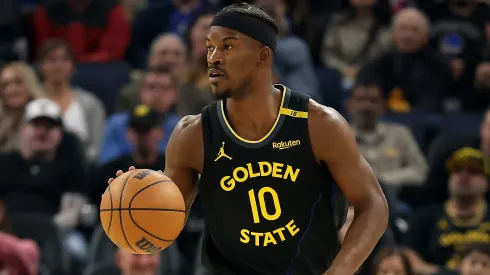 Jimmy Butler III #10 of the Golden State Warriors dribbles the ball against the Charlotte Hornets at Chase Center on February 25, 2025 in San Francisco, California.