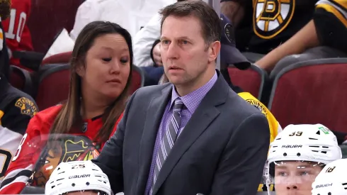Head Coach Joe Sacco of the Boston Bruins looks on against the Chicago Blackhawks during the third period at the United Center on December 04, 2024 in Chicago, Illinois.