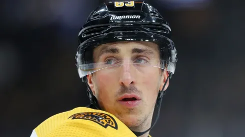 Brad Marchand #63 of the Boston Bruins looks on during the first period of the game against the Calgary Flames at TD Garden on February 25, 2020 in Boston, Massachusetts.
