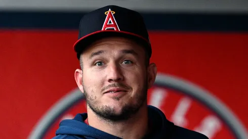 Mike Trout #27 of the Los Angeles Angels looks on from the dugout during the first inning against the Colorado Rockies at Angel Stadium of Anaheim on August 01, 2024 in Anaheim, California.