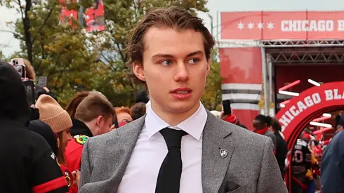 Connor Bedard #98 of the Chicago Blackhawks arrives to the red carpet prior to the game against the Vegas Golden Knights at the United Center on October 21, 2023 in Chicago, Illinois.