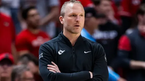 Head coach Darian Devries of the West Virginia Mountaineers walks along the sideline during the second half of the game against the Texas Tech Red Raiders at United Supermarkets Arena on February 22, 2025 in Lubbock, Texas.