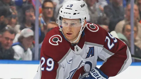 Nathan McKinnon #29 of the Colorado Avalanche skates with the puck against the Toronto Maple Leafs during the first period in an NHL game at Scotiabank Arena on March 19, 2025 in Toronto, Ontario, Canada.