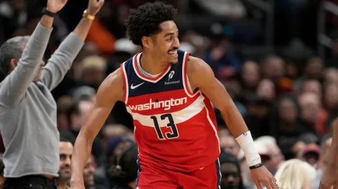 Jordan Poole #13 of the Washington Wizards reacts after scoring a three-pointer against the Cleveland Cavaliers during the first half at Capital One Arena on February 07, 2025 in Washington, DC.