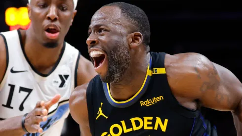 Draymond Green #23 of the Golden State Warriors drives against Onyeka Okongwu #17 of the Atlanta Hawks during the third quarter at State Farm Arena on March 22, 2025 in Atlanta, Georgia.