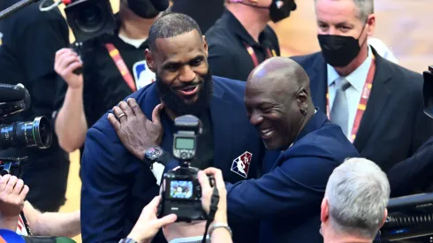 Michael Jordan and LeBron James hug after the presentation of the NBA 75th Anniversary Team during the 2022 NBA All-Star Game at Rocket Mortgage Fieldhouse on February 20, 2022 in Cleveland, Ohio.