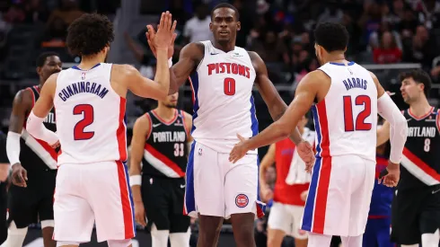 Jalen Duren, Cade Cunningham and Tobias Harris of the Detroit Pistons against the Portland Trail Blazers on January 06, 2025