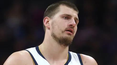 Nikola Jokic #15 of the Denver Nuggets plays the Portland Trail Blazers in the first quarter at Ball Arena.