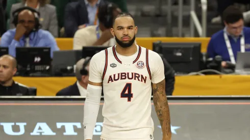 Johni Broome #4 of the Auburn Tigers walks the court during the first half in the Final Four game of the NCAA Men's Basketball Tournament against the Florida Gators at the Alamodome on April 05, 2025 in San Antonio, Texas.
