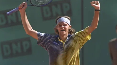Gustavo Kuerten of Brazil celebrates after victory against Sergi Bruguera of Spain in the French Open at Roland Garros Stadium in Paris, France.