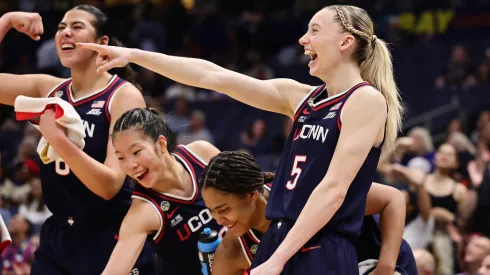 Paige Bueckers and the Huskies celebrating