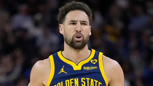 Klay Thompson #11 of the Golden State Warriors reacts after making a three-point shot against the Utah Jazz during first half at Chase Center on April 07, 2024.