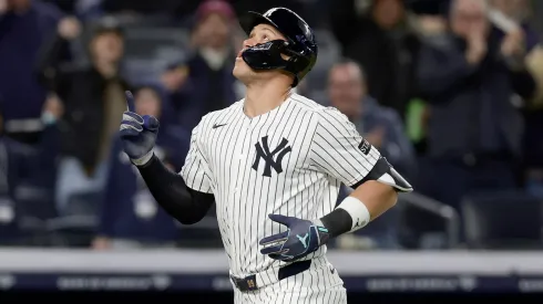 Aaron Judge #99 of the New York Yankees gestures as he runs the bases on his seventh inning home run against the Kansas City Royals at Yankee Stadium on April 16, 2025 in New York City.