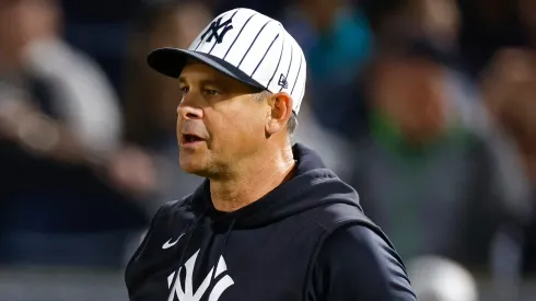 Manager Aaron Boone #17 of the New York Yankees walks to the mound to make a pitching change in the fourth inning during a spring training game against the Toronto Blue Jays at George M. Steinbrenner Field on February 28, 2025 in Tampa, Florida.
