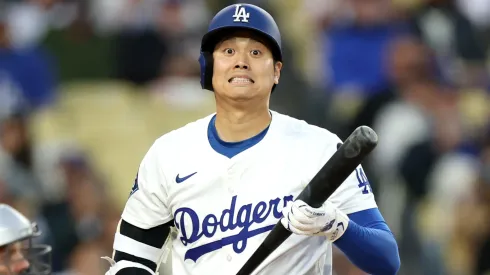 Shohei Ohtani #17 of the Los Angeles Dodgers reacts after a pitch against the Colorado Rockies at Dodger Stadium on April 15, 2025 in Los Angeles, California. All players are wearing the number 42 in honor of Jackie Robinson Day.