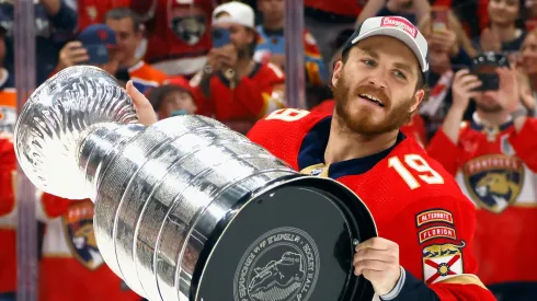 Matthew Tkachuk #19 of the Florida Panthers celebrates with the Stanley Cup following a 2-1 victory over the Edmonton Oilers in Game Seven of the 2024 NHL Stanley Cup Final at Amerant Bank Arena on June 24, 2024 in Sunrise, Florida.