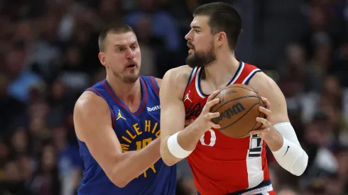 Nikola Jokic #15 of the Denver Nuggets guards Ivica Zubac #40 of the Los Angeles Clippers