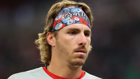 Bryson Stott #5 of the Philadelphia Phillies looks on in the eighth inning against the Atlanta Braves at Truist Park on April 08, 2025 in Atlanta, Georgia.