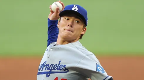 Yoshinobu Yamamoto #18 of the Los Angeles Dodgers pitches in the first inning against the Atlanta Braves at Truist Park on May 02, 2025 in Atlanta, Georgia.