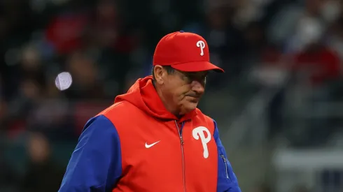Manager Rob Thomson #59 of the Philadelphia Phillies walks off the field in the sixth inning against the Atlanta Braves. at Truist Park on April 08, 2025 in Atlanta, Georgia.