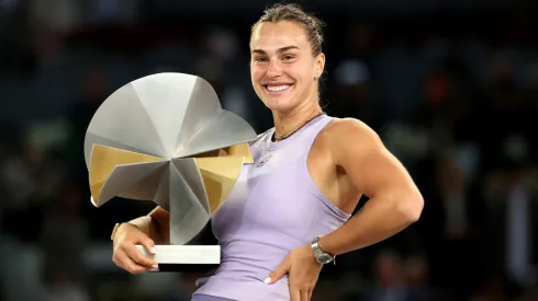 Aryna Sabalenka poses for a photo with her trophy after victory against Coco Gauff of United States in the Women's Singles Final Match of the Madrid Open.
