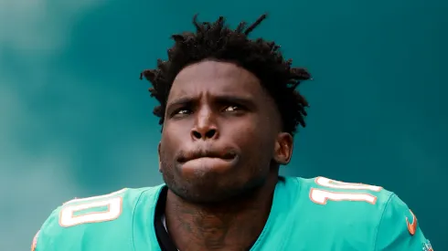 Tyreek Hill #10 of the Miami Dolphins runs onto the field prior to the game against the San Francisco 49ers at Hard Rock Stadium on December 22, 2024 in Miami Gardens, Florida.