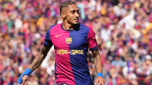 Raphinha of FC Barcelona celebrates scoring his team's third goal with teammate Ferran Torres during the LaLiga match between FC Barcelona and Real Madrid CF at Estadi Olimpic Lluis Companys on May 11, 2025 in Barcelona, Spain.