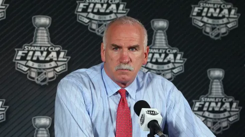 Head coach Joel Quenneville of the Chicago Blackhawks speaks to the media after a 2-1 victory against the Tampa Bay Lightning during Game One of the 2015 NHL Stanley Cup Final at Amalie Arena on June 3, 2015 in Tampa, Florida.