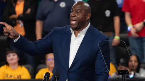 Former NBA star Earvin "Magic" Johnson speaks at a rally with Democratic presidential nominee Vice President Kamala Harris at the Dort Financial Center on October 04, 2024 in Flint, Michigan.