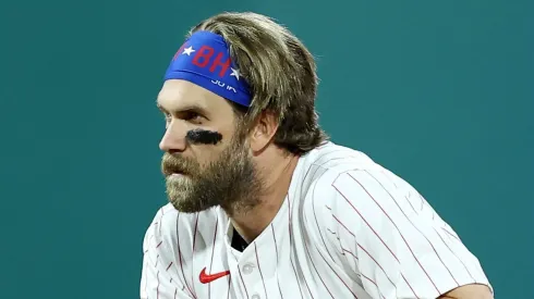 Bryce Harper #3 of the Philadelphia Phillies kneels on second base in the seventh inning against the San Francisco Giants at Citizens Bank Park on April 14, 2025 in Philadelphia, Pennsylvania.