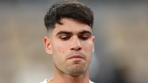 Carlos Alcaraz of Spain looks on against Fabian Marozsan of Hungary during Roland Garros.