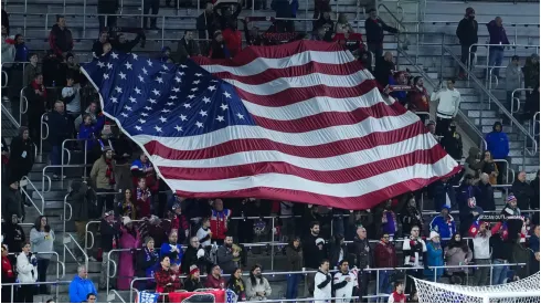 Fans of the United States hold the flag