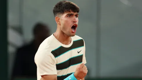 Carlos Alcaraz of Spain celebrates a point against Damir Dzumhur of Bosnia and Herzegovina during the third round of Roland Garros.