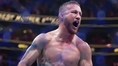 Justin Gaethje celebrates beating Dustin Poirier during their BMF Title Lightweight fight at UFC 291 at the Delta Center July 29, 2023 at the in Salt Lake City, Utah.