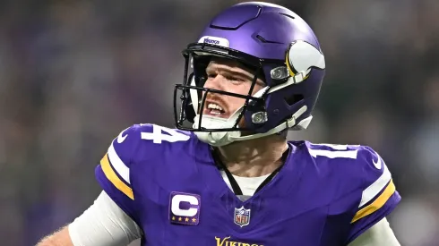 Sam Darnold #14 of the Minnesota Vikings reacts after a throwing a touchdown pass during the second quarter against the Green Bay Packers at U.S. Bank Stadium on December 29, 2024 in Minneapolis, Minnesota.