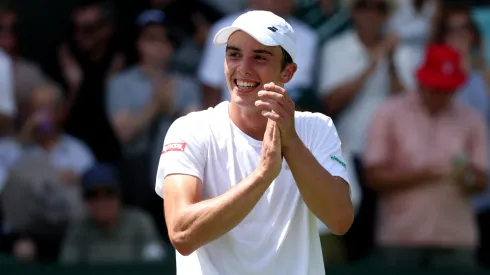 Oliver Tarvet of Great Britain celebrates victory against Leandro Riedi of Switzerland during the Gentlemen's Singles first round match on day one of The Championships Wimbledon 2025.